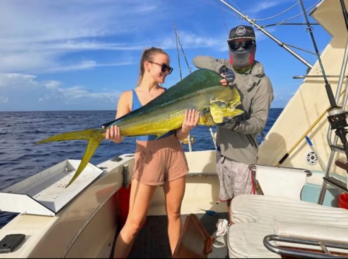 Angler with a colorful mahi-mahi dolphin fish