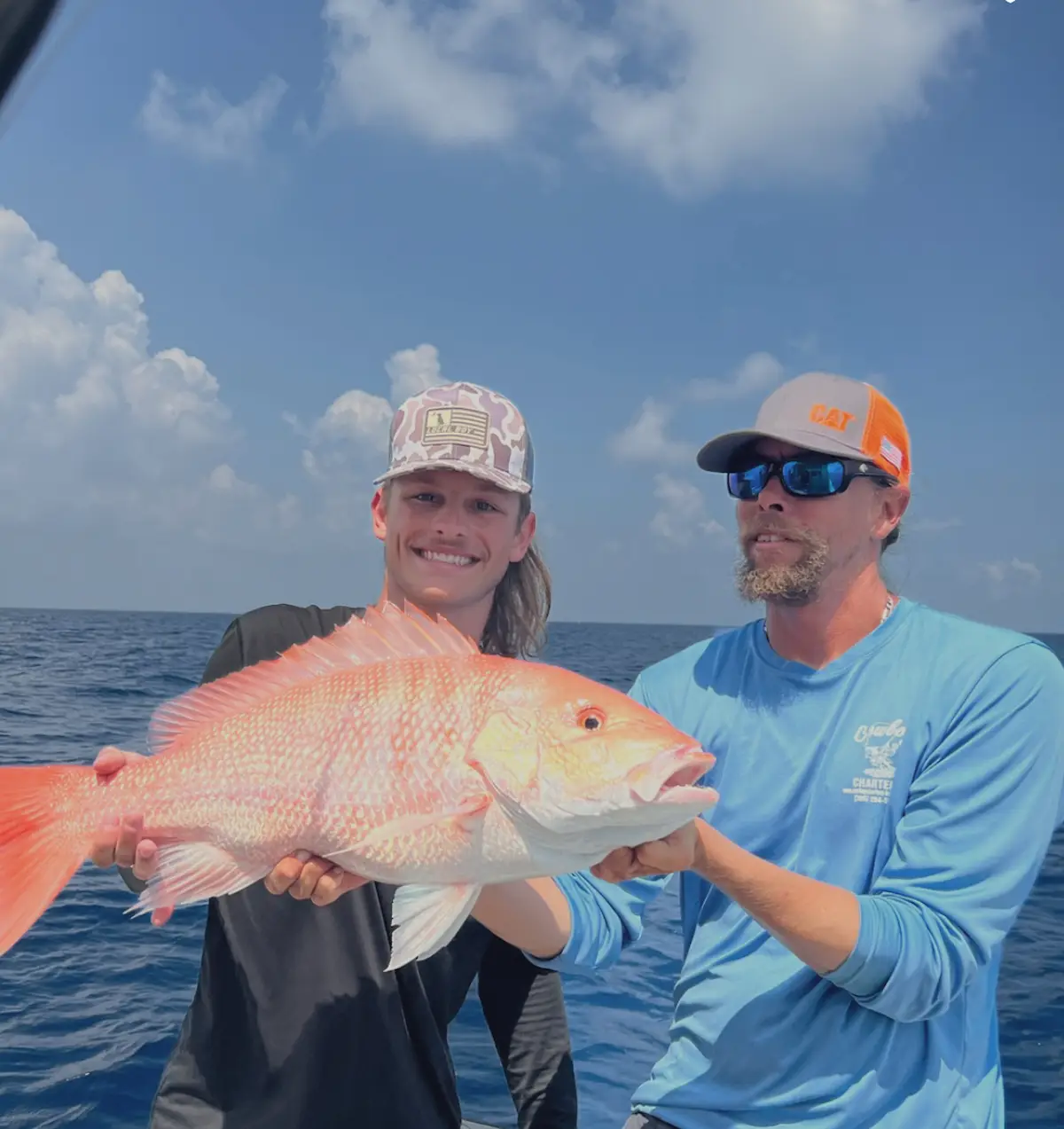 Two anglers with a gorgeous red snapper